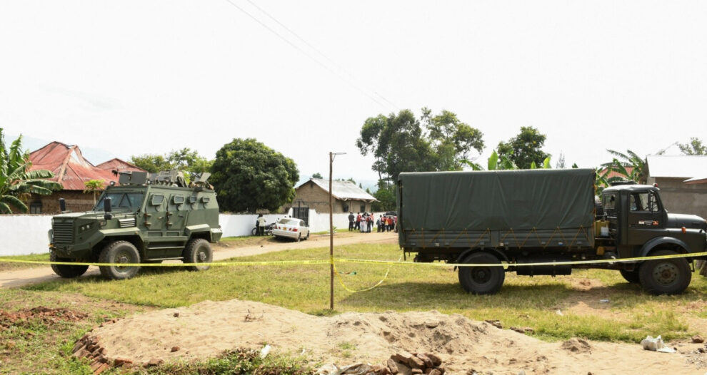 FILE - Ugandan security forces cordon the scene outside the Mpondwe Lhubirira Secondary School, after militants linked to the rebel Allied Democratic Forces killed and abducted multiple people, in Mpondwe, western Uganda, June 17, 2023.